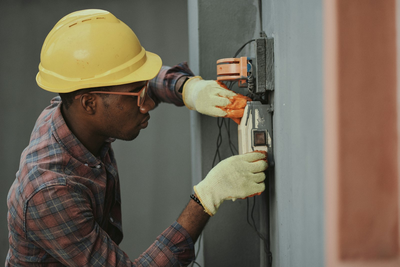 Home inspector checking roof and HVAC on a Phoenix desert house